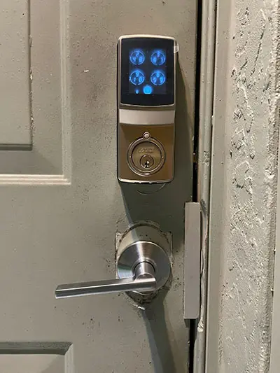 A door lock with the key to the room.
